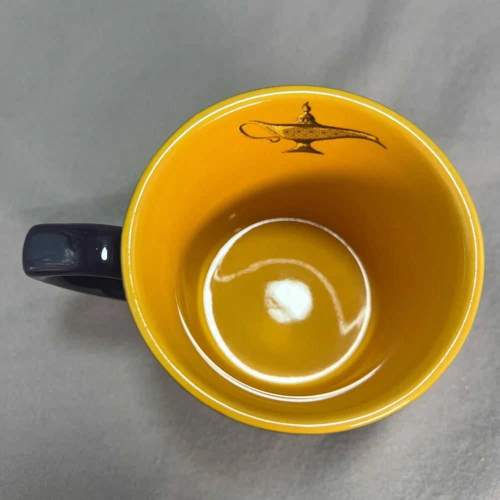 Disney Aladdin Broadway Musical‎ Coffee Mug Purple Yellow Genie Lamp Inside